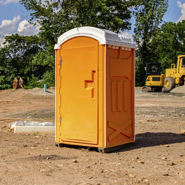 what is the cost difference between standard and deluxe porta potty rentals in Bourneville